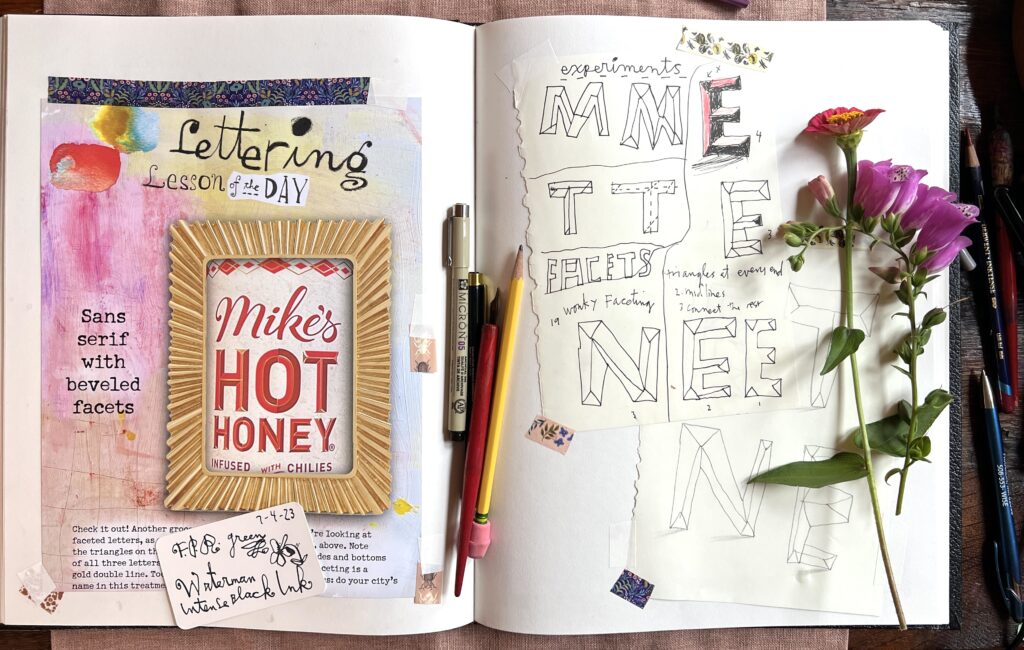 IMG 6346 Lettering example in a book on a desk