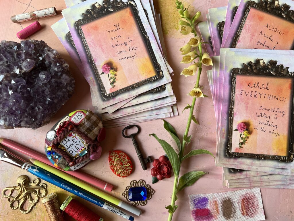 Oracle cards by Lilla Rogers laid out on a desk