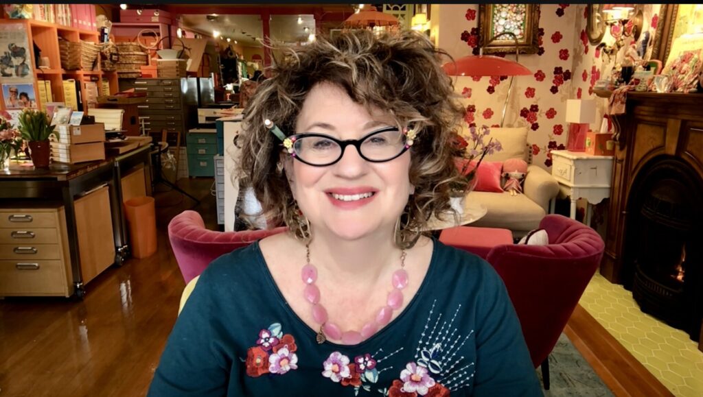 Lilla pink necklace to camera